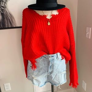 Red distressed sweater